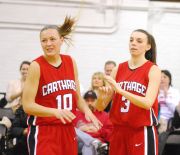 Former Maine South star Allison Groessl, left, and Deerfield's Dani Ripkey are two key members of Carthage College's women's basketball team. (Jeff Vorva/Tribune)