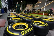 Pirelli tyres worked  on by a Team Lotus mechanic.
Formula One World Championship, Rd 14, Singapore Grand Prix, Preparations, Marina Bay Street Circuit, Singapore, Thursday, 22 September 2011