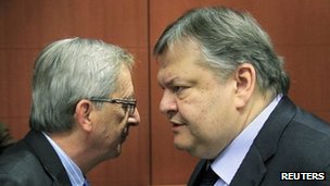 Luxembourg's Prime Minister and Eurogroup chairman, Jean-Claude Juncker, talks with Greece's Finance Minister Evangelos Venizelos 