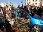 Israeli air strikes kill 12 Palestinians, including leader of Gaza armed group