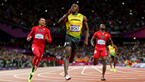Usain Bolt of Jamaica wins the men’s 100m final on day 9 of the London 2012 Olympic Games, leaving Ryan Bailey and Justin Gatlin of the U.S. in his wake