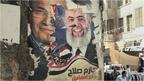 A defaced poster of presidential candidates in Cairo, Egypt