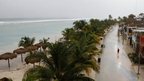 A man walks in a nearly deserted street Mahahual, Mexico, Tuesday, 7 August, 2012 