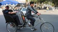  In Beijing, a wild ride on rickshaw 