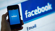 Facebook posts a loss but makes gains on mobile ad revenue