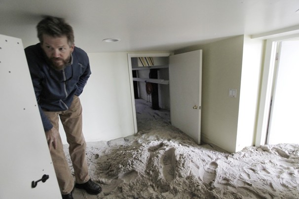 Jeffrey Holloway begins the process of cleaning and renovating the home of a client at 56th Street and Central Avenue in Ocean City, N.J.