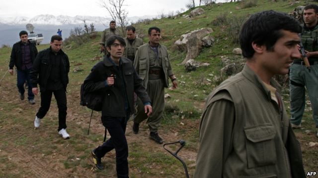 A picture taken on March 13, 2013 shows Turkish prisoners as they were released in the northern Iraqi city of Dohuk, after being held for two years in northern Iraq by the Kurdish Workers' Party (PKK). 