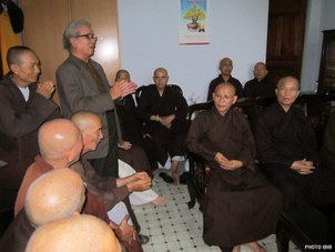 Le Cong Cau (standing, right) addresses a UBCV meeting in Ho Chi Minh City in December 2012.