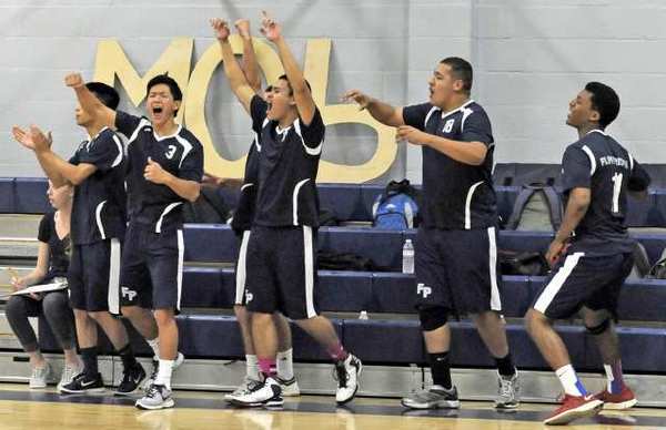 The Flintridge Prep boys' volleyball bench reacts during the fourth game of a Prep League volleyball match against Chadwick on Wednesday. The Rebels clinched a league championship after a 25-15, 23-25, 25-18, 24-26, 15-13 victory. (Photo by Libby Cline)