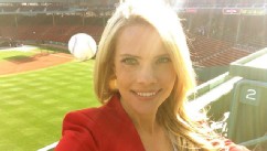 PHOTO: Sports Reporter Kelly Nash almost gets hit by a ball at Fenway Park.