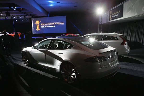 A Tesla Model S on display after winning the 2013 World Green Car of the Year award at the New York Auto Show in March. The car has just received a 99 out of 100 rating from Consumer Reports.
