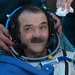 Chris Hadfield upon returning to Earth on Monday. Before that, his five months on the International Space Station included musical performances, many Twitter postings and an appearance on a mock TV news program.