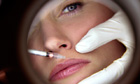 The needle and the damage done … a woman receives a Botox injection.