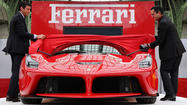 Ferrari hybrid makes a stop in Paris