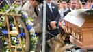 Police dog's salute to fallen partner:  Figo pays his last respects to Jason Ellis.