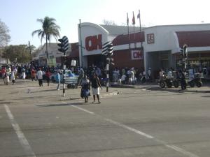 Queues for food outside a supermarket in Zimbabwe