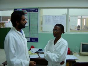 Ilesh Jani talking to a member of his staff in the HIV laboratory 2005