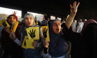 Members of the Muslim Brotherhood and supporters of ousted Egyptian president Mohamed Morsi shout sl