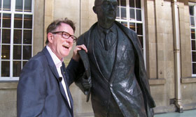 Peter Mandelson with a statue of Philip Larkin