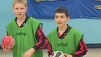 Handball players at Cardinal Heenan Catholic High School