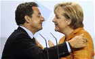 Angela Merkel and Nicolas Sarkozy kiss 