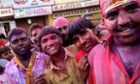 Men celebrating Holi festival in Dwarka, Gujarat, India