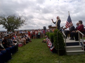 An Actor Portraying George Washington Addressing the Crowd