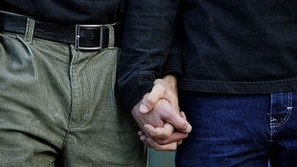 Two  men holding hands
