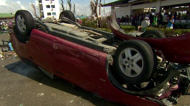 Overturned car at Tacloban's airport