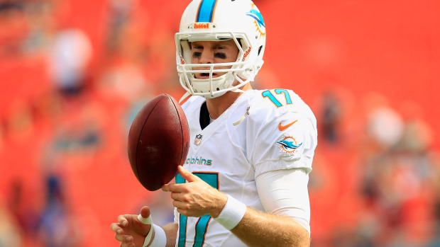 MIAMI GARDENS, FL - DECEMBER 15: Ryan Tannehill #17 of the Miami Dolphins practices prior to the game against the New England Patriots at Sun Life Stadium on December 15, 2013 in Miami Gardens, Florida. (Photo by Chris Trotman/Getty Images)