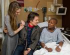 
	Ethan Hawke and his daughter Maya paid a surprise visit to patients at New York Methodist Hospital yesterday afternoon. Sonya Clarke, pictured, was thrilled by the visit from Ethan and Maya.
