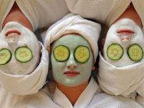 Women undergo facial beauty treatments at a spa. (Photo credit TORSTEN BLACKWOOD/AFP/Getty Images)