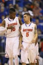 University of Florida players Will Yeguete, left, and Scottie Wilbekin have the Gators in the top 5 in both major polls. The Gators will go for their 12th straight win Thursday at Mississippi State. Getty Images