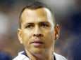 Alex Rodriguez looks on from the dugout during