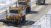 New York State Department of Transportation trucks clearing