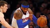 Carmelo Anthony controls the ball during a game