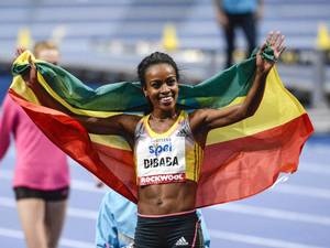 Genzebe Dibaba of Ethiopia celebrates after winning the women's 3000m during the XL Galan indoor track and field meet at the Stockholm Globe Arena. Dibaba set a new world indoor record of 8:16.60