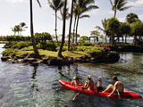 Photo: Kayakers in a tropical lagoon