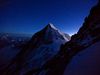 Photo: Climbers headlamps are seen near the peak of Everest at night.