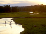 Picture of two children playing in a river, Yellowstone National Park, Wyoming