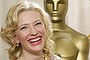 Cate Blanchett poses with her Oscar for The Aviator.