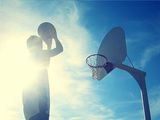Picture of a boy shooting a basketball