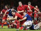 Sam Warburton of Wales scores his sides second try as Nicolas Mas of France fails to hold him up