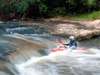Photo: Kayaking river rapids