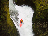 Photo: Kayaker going down waterfall