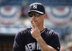 
	New York Yankees manager Joe Girardi stands on the field before an exhibition baseball game against the Tampa Bay Rays, Wednesday, March 5, 2014, in Port Charlotte, Fla. (AP Photo/Steven Senne)
