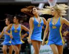 
UCLA Bruins dance team members, including MaCall Manor (R), perform during the team's game against the Northwestern Wildcats during the Continental Tire Las Vegas Invitational.