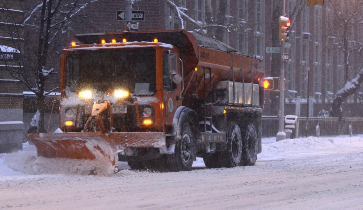 
	A snow plow works its way North on Madison Ave. near 83rd St. Friday morning, Jan. 3, 2014 in Manhattan. (Photo by Barry Williams / for New York Daily News)
