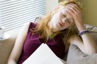 Woman stressed over paperwork