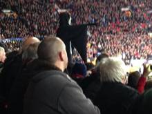 A fan dressed up as the Grim Reaper during Manchester United's win over Olympiakos, shouting at David Moyes 